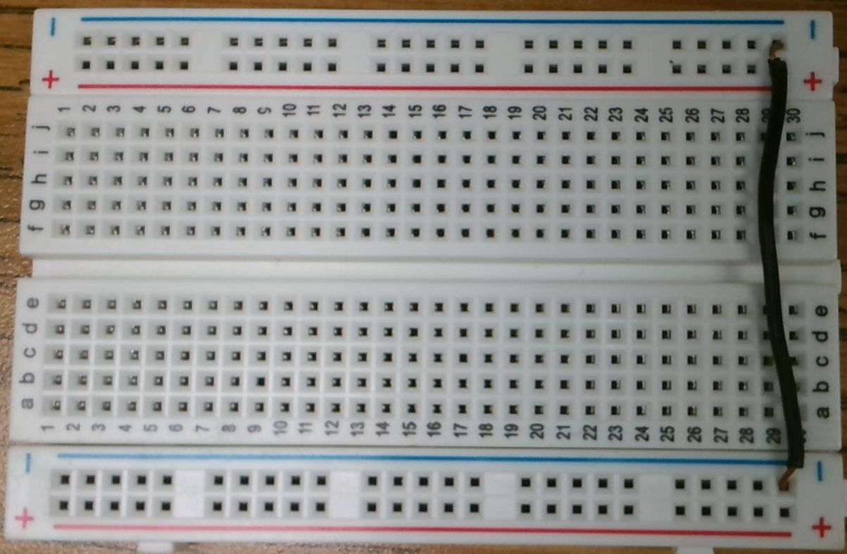 Black wire connecting blue buses