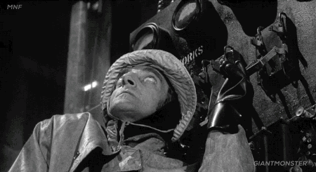 Knife switch in action in a movie scene - character pulls lever to bring Frankenstein's monster to life