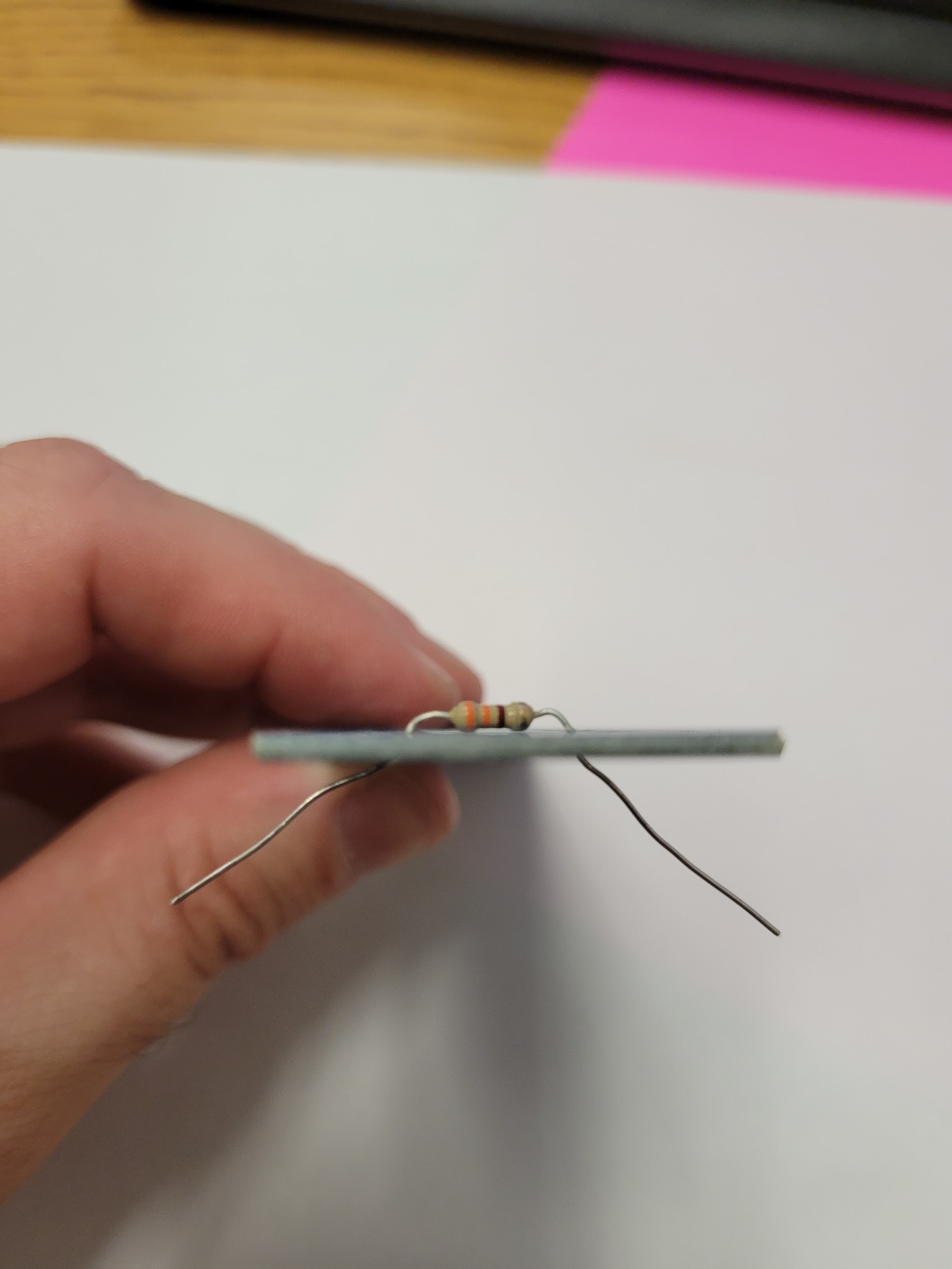 Pulling resistor leads outward on the back of the board