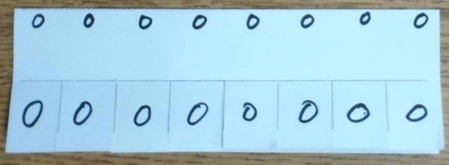 A second row of zeros written above the flaps